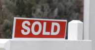 A sold sign for a house that might be a preforeclosure.